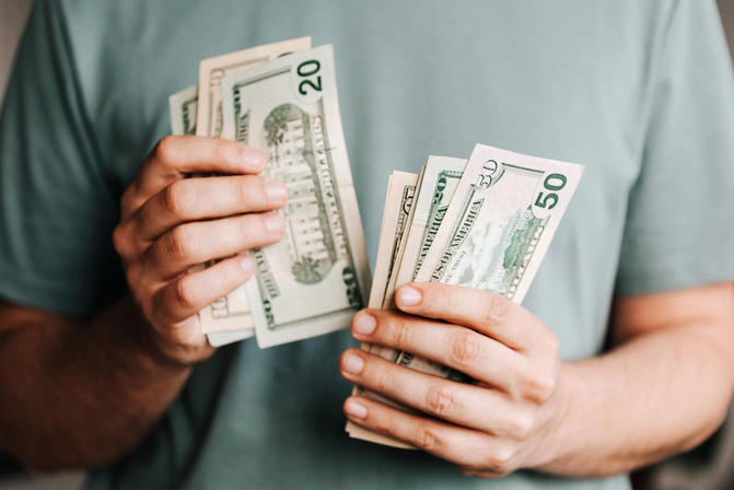 a preson holding money